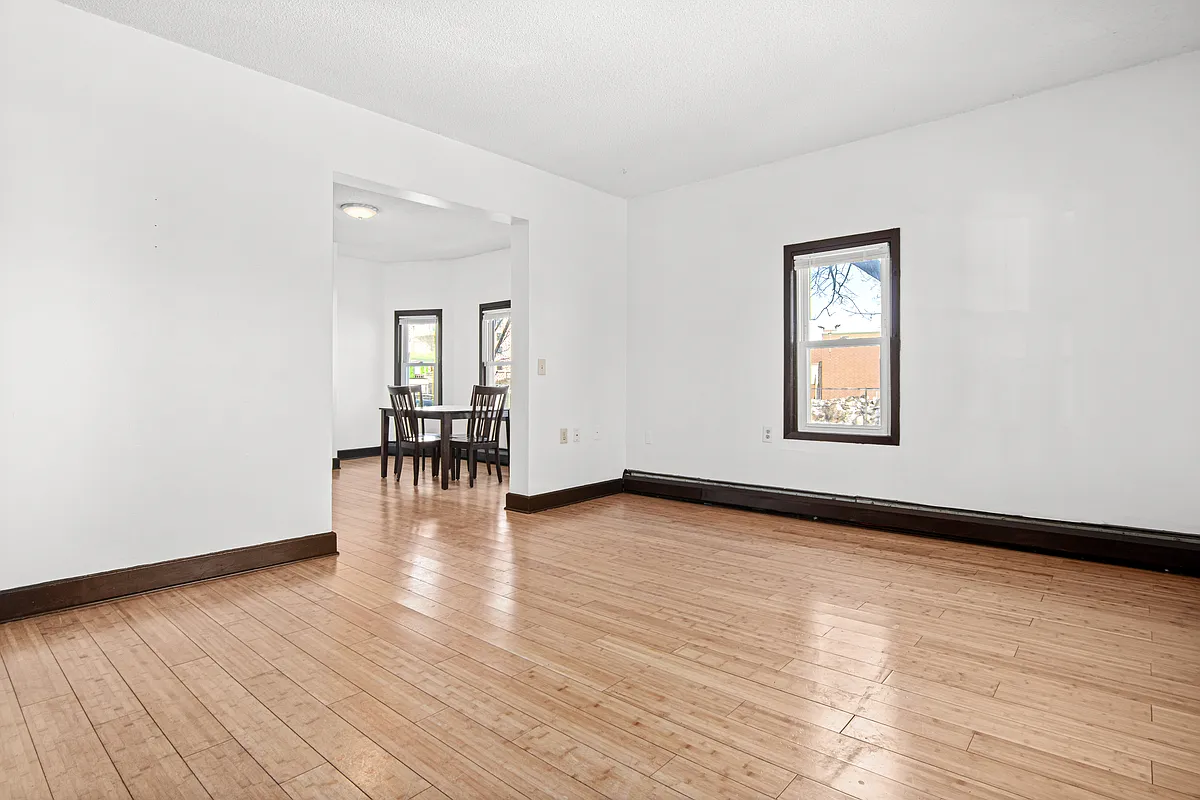 Spacious living room with beautiful hardwood floor through out. - 2100 14th Ave S #1