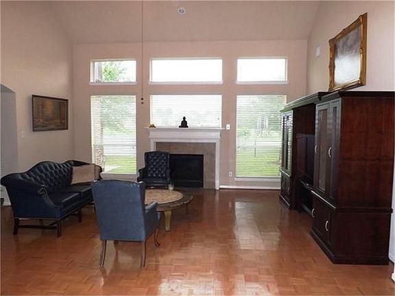 There are endless possibilities for entertaining in the huge, abundantly lighted family room. 