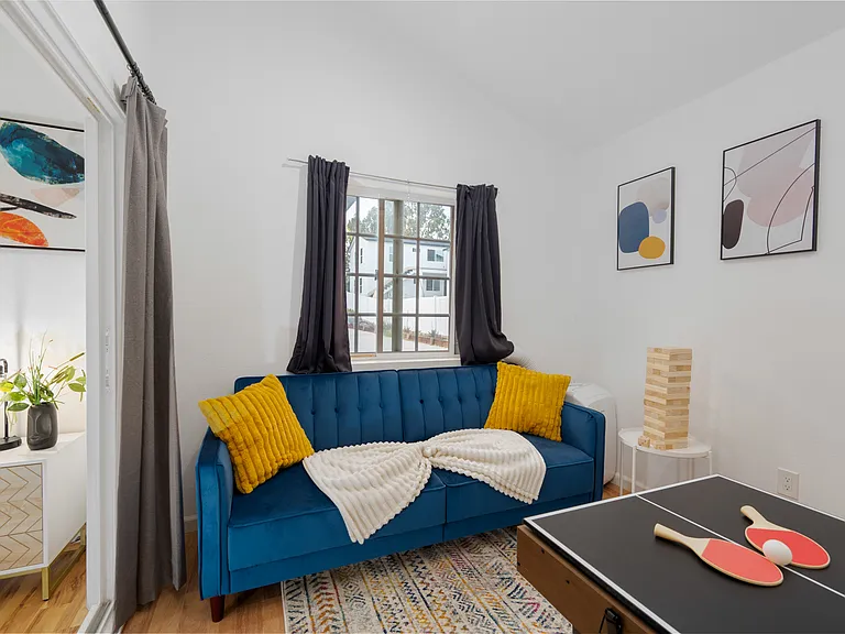 Blend of entertainment and comfort, this game room is more than just a place to play _ it's a dynamic living space perfect for relaxing, gathering, or enjoying some friendly competition.