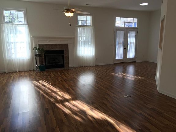 Large great room with gas fireplace and 10  ceilings 