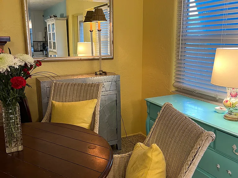 Dining area with server and buffet for entertaining or throwing your books, games, and laptops on.