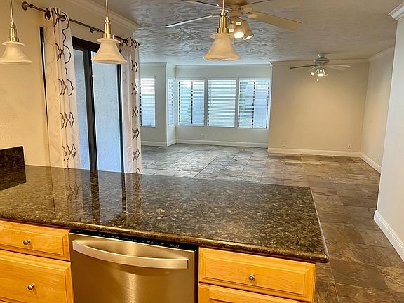 Open floor plan, from the kitchen to the living area.