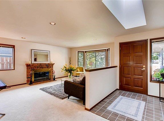 Spacious entry way with skylight