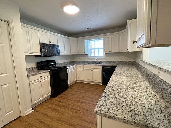 Kitchen with new counters and appliances
