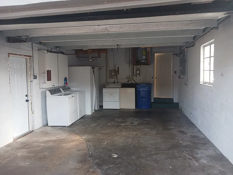 View from garage door entry toward back door entry to house.