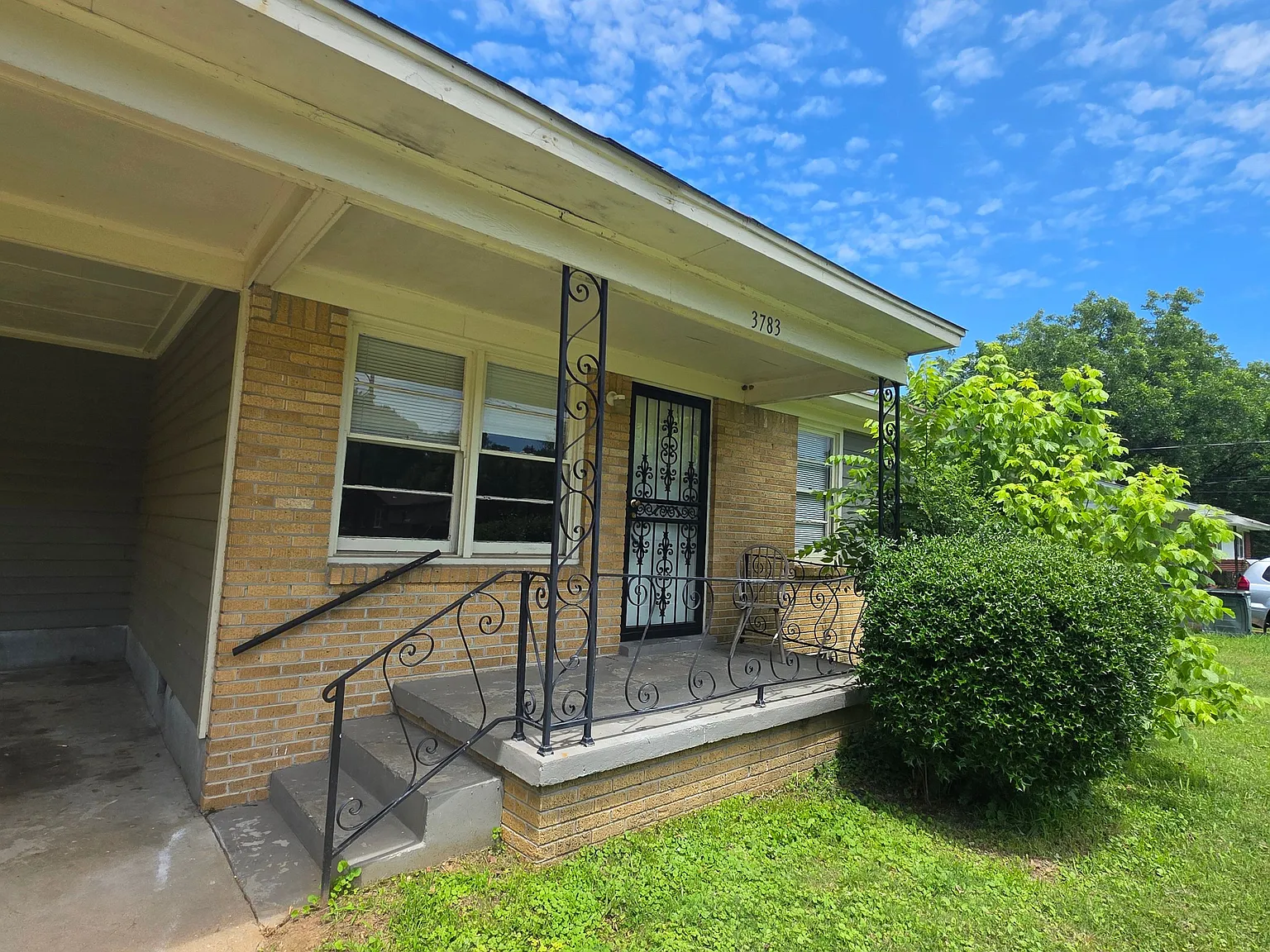 Charming 3-Bedroom Home with Fireplace, Carport & Fenced Backyard — Photo 3