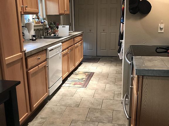 Kitchen, washer and dryer in space at end of kitchen