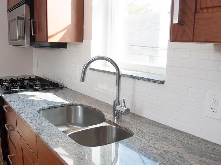 Stone countertop and double sink, Grohe faucet