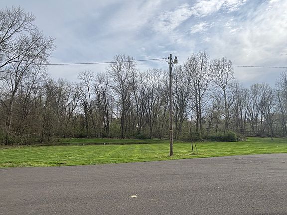 Spacious city-owned front yard view. Lots of wildlife to view over morning coffee.