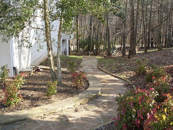 Beautiful Stone Work in Back yard overlooking Golf Course!