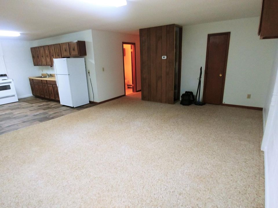 Spacious living room and kitchen combined area.