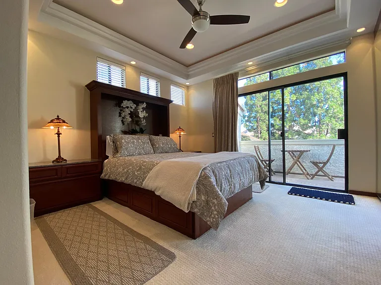 Master bedroom with balcony access