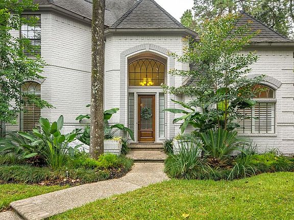 The front door on this beautiful custom painted brick home was just refinished.