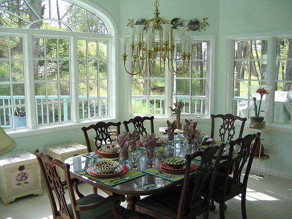 Gorgeous Dining Area With Windows Galore!