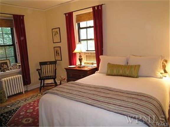 Quiet corner bedroom with Both Eastern and Southern Exposures.