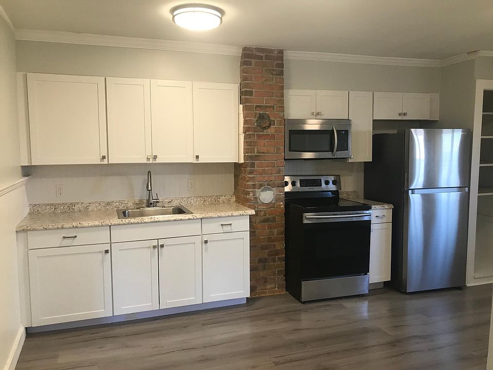 Large, updated kitchen with plenty of space for a dining room table or a large island.
