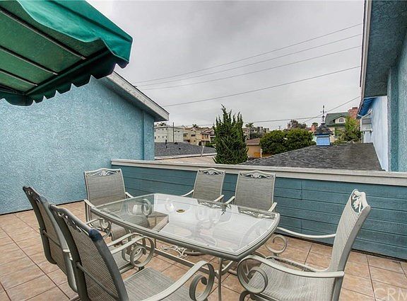 Good sized tile balcony ready for your outside dining and entertaining