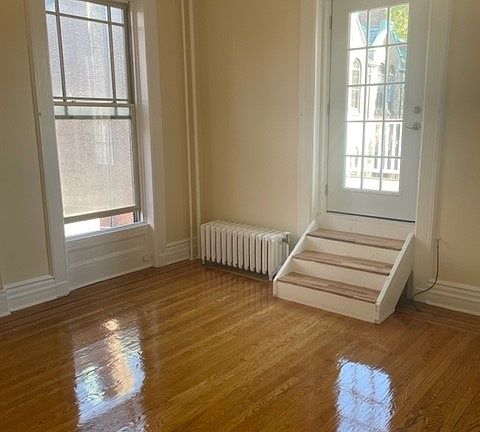Living room + steps/door to deck