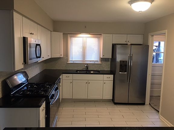 3rd image of 954 E 166th Pl