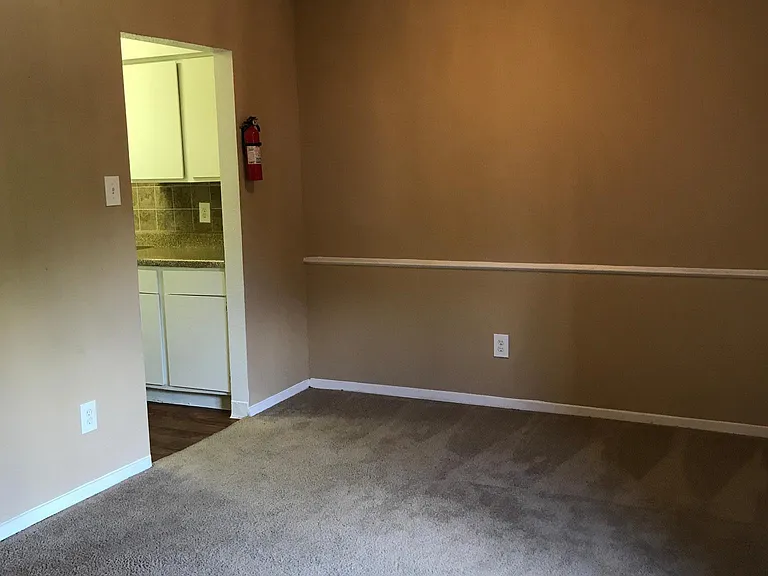Dining room and kitchen entrance in our Jr. One bedroom