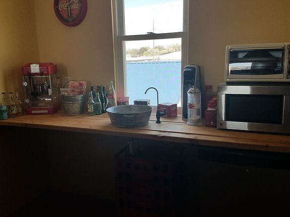 Sink area in game room.