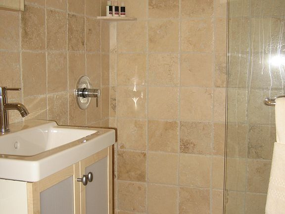 Marble tiled shower & floors