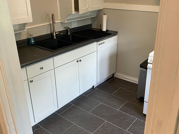 Bring it composite sink with large kitchen faucet and dishwasher