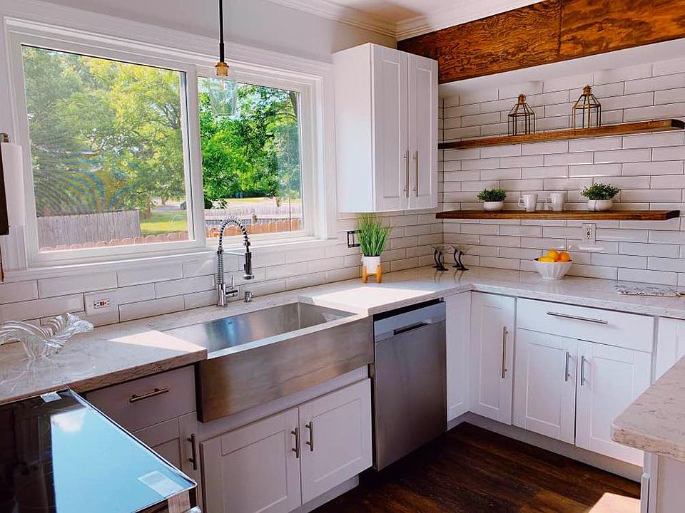 Kitchen with brand new appliances, new cabinets and quartz counter tops