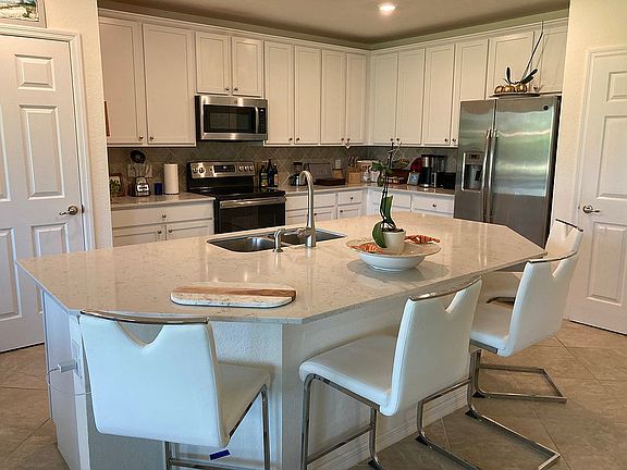 4th image of 11772 Grand Belvedere Way Unit 101