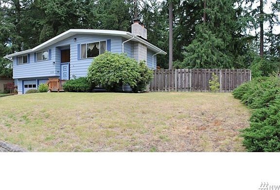 Huge yard with fenced rear yard, storage/wood shed and room for a small RV or boat.