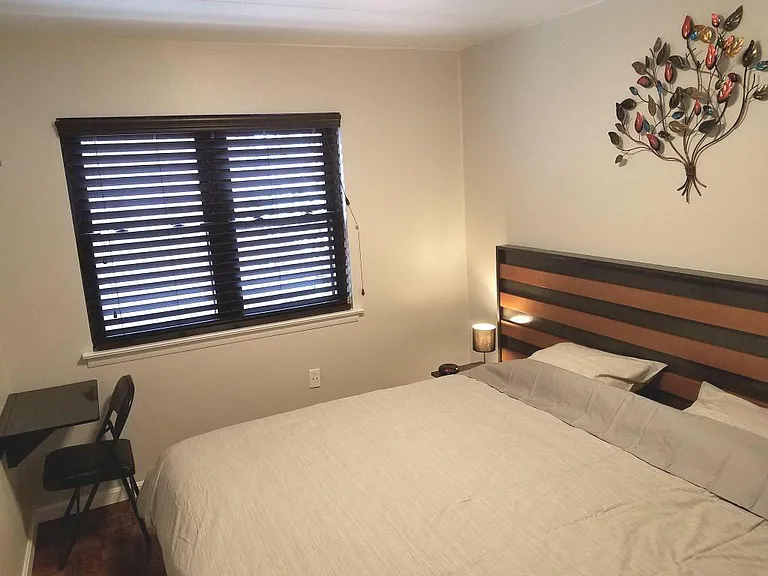 And this is the "second" bedroom again, this time set up with a king bed. The window looks out over your patio/garden area.