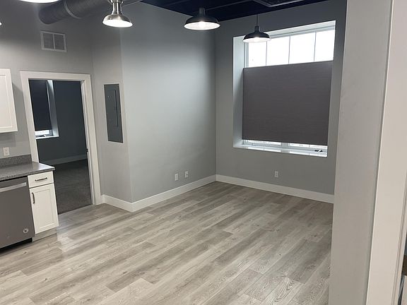 Dining area in kitchen. Window view of Festival Square
