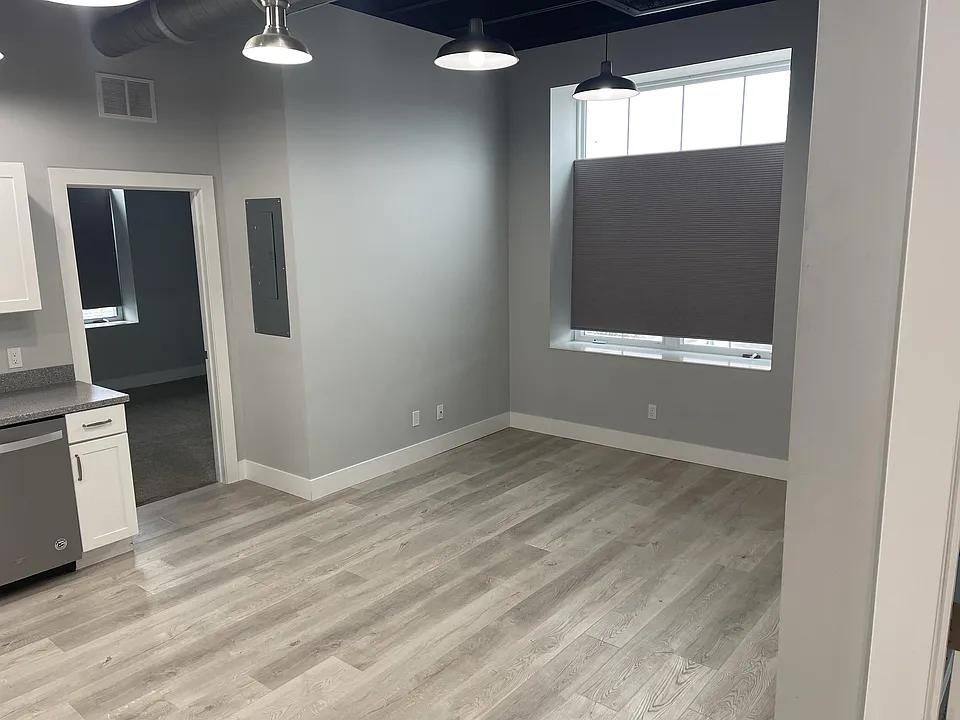 Dining area in kitchen. Window view of Festival Square