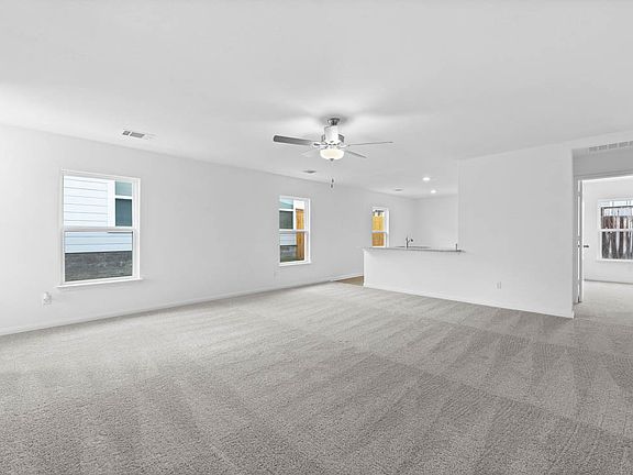 The spacious family room is perfect for gatherings!