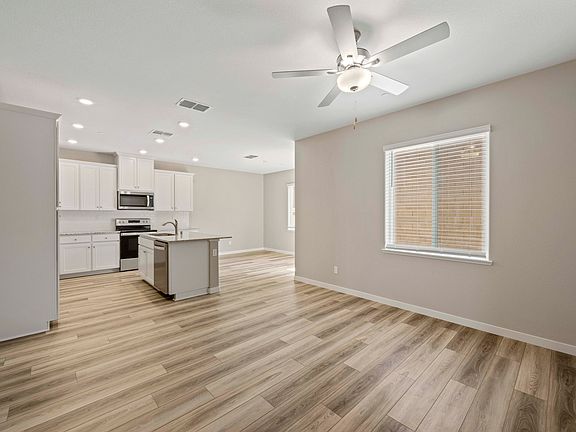 The family room is open to the kitchen and dining room.