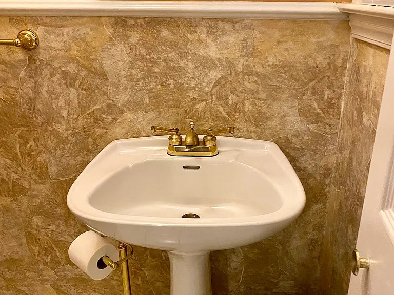 Half bathroom off kitchen