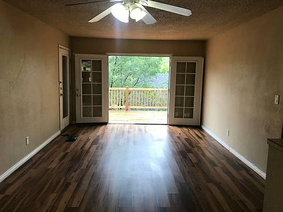 French doors opening to deck from living room