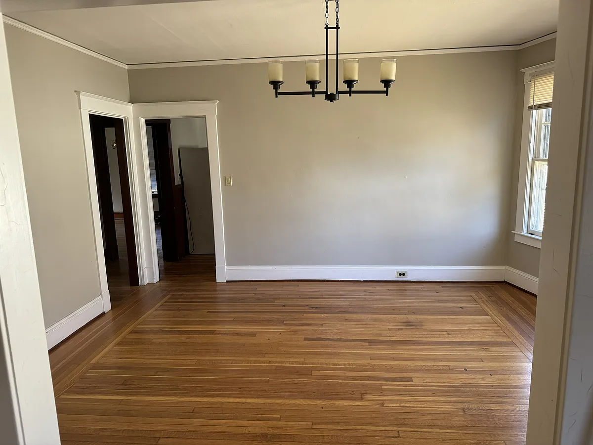 Spacious dining area perfect for meals and gatherings. - 14 Slater Ave