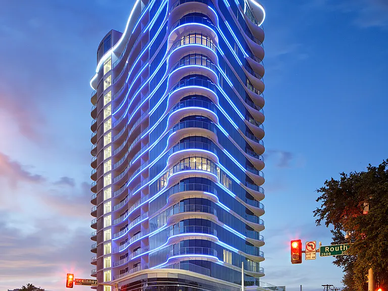 Beautiful, lit exterior of One uptown