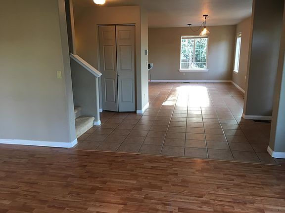 From living room across entry to dining room 