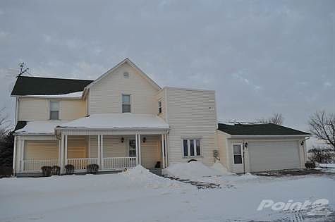 Wrap around porch and attached garage