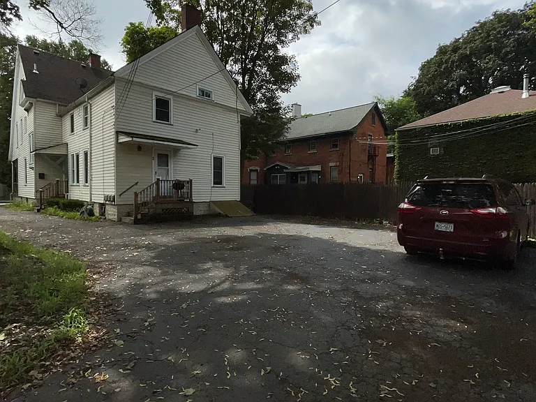 Rear view of building and parking lot.