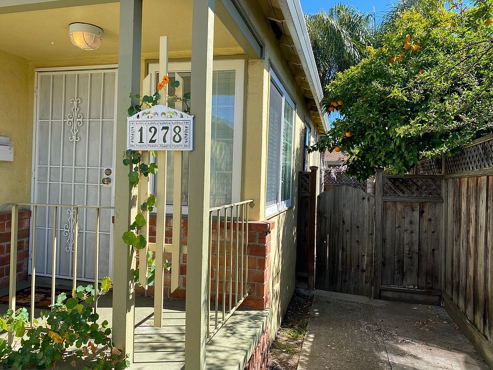 Front porch and side gate to backyard