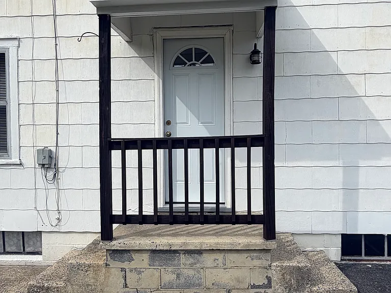 Convenient side entrance, with new door & frame, from driveway.