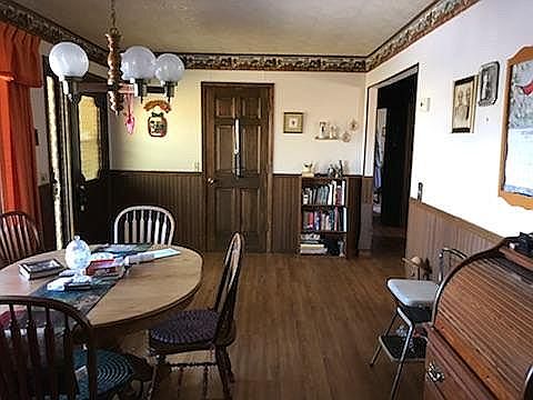 Dining room with front door left