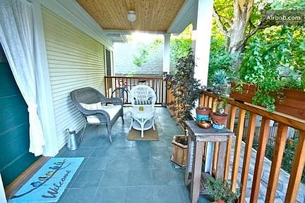 Entry via covered deck, rear stairs