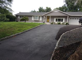 30 Wickatunk Rd, Manalapan, NJ 07726
