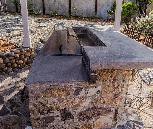 outdoor B.B.Q fridge, seating lights, fan, great huge fenced yard for entertaining