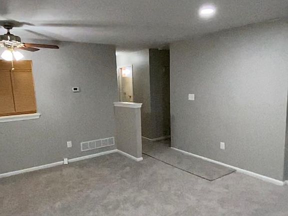 Family Room with recessed lighting and fan - New Carpet throughout