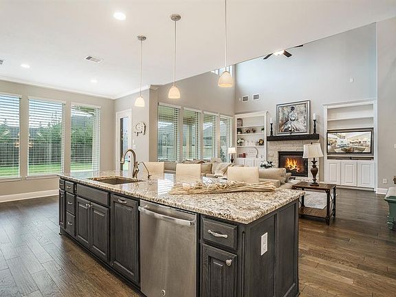 View of living space and breakfast room from the expansive kitchen